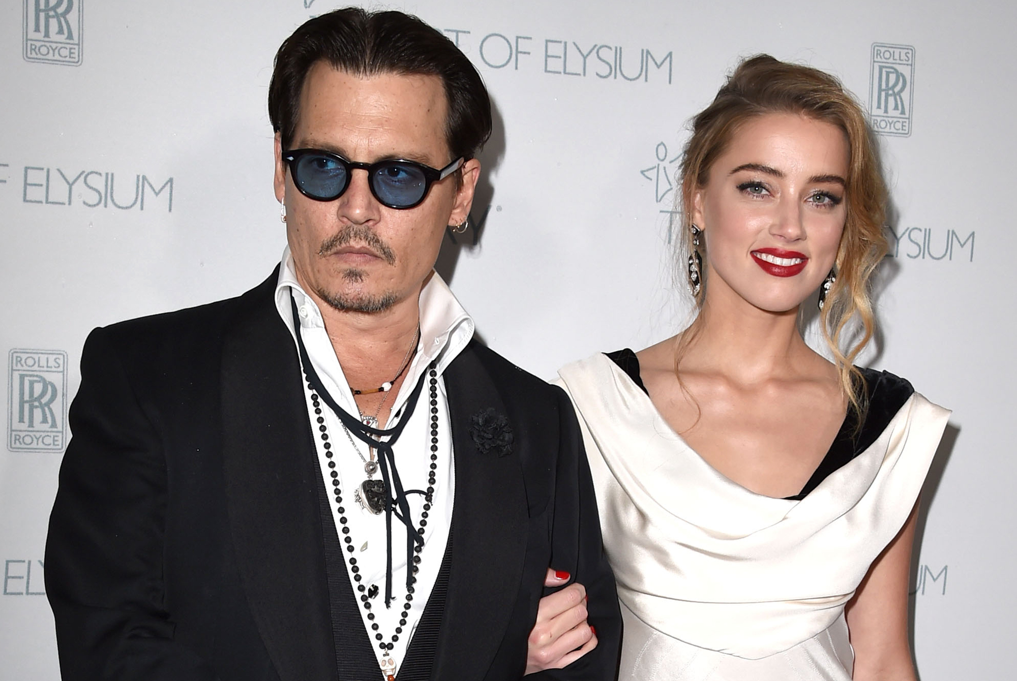 SANTA MONICA, CA - JANUARY 10: Johnny Depp and Amber Heard arrives at the The Art Of Elysium 8th Annual Heaven Gala at Hangar 8 on January 10, 2015 in Santa Monica, California. (Photo by Steve Granitz/WireImage)