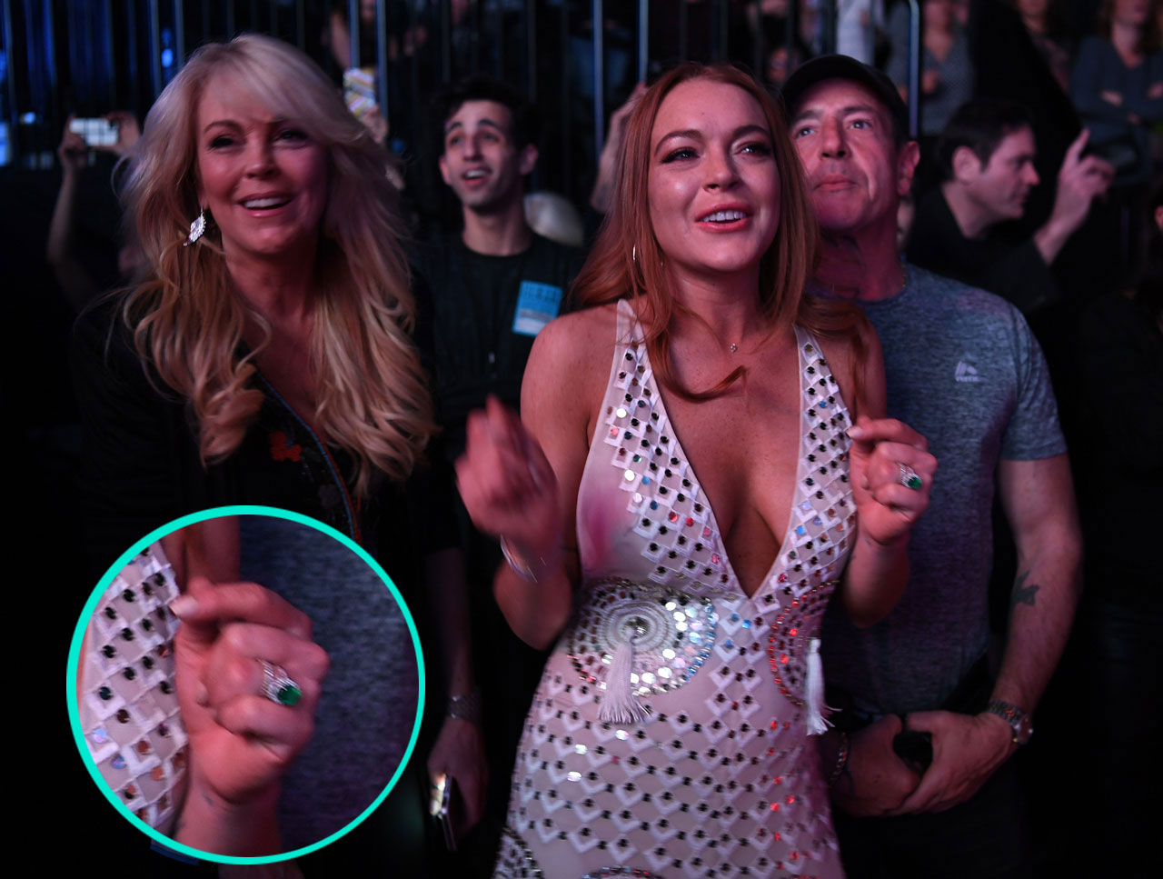 Lindsay Lohan at DURAN DURAN concert. Lindsay Lohan was accompanied by her sister Ali, mom Dina and father Michael, singing into DURAN DURAN tunes during their Tuesday evening concert at Barclays Center in Brooklyn, NYC. Lindsay Lohan (29) and her Russian boyfirend Egor Tarabasov (22) just got engaged over the weekend. Pictured: Lindsay Lohan at DURAN DURAN concert Ref: SPL1260911 120416 Picture by: Paul Martinka / Splash News Splash News and Pictures Los Angeles:310-821-2666 New York:212-619-2666 London:870-934-2666 photodesk@splashnews.com 