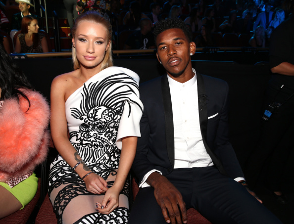 INGLEWOOD, CA - AUGUST 24: Singer Iggy Azalea (L) and professional basketball player Nick Young attend the 2014 MTV Video Music Awards at The Forum on August 24, 2014 in Inglewood, California. (Photo by Christopher Polk/MTV1415/Getty Images for MTV)