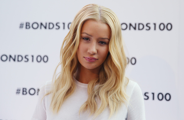 SYDNEY, AUSTRALIA - AUGUST 19: Iggy Azalea poses during Bonds 100th birthday celebration event at Cafe Sydney on August 19, 2015 in Sydney, Australia. (Photo by Don Arnold/WireImage)