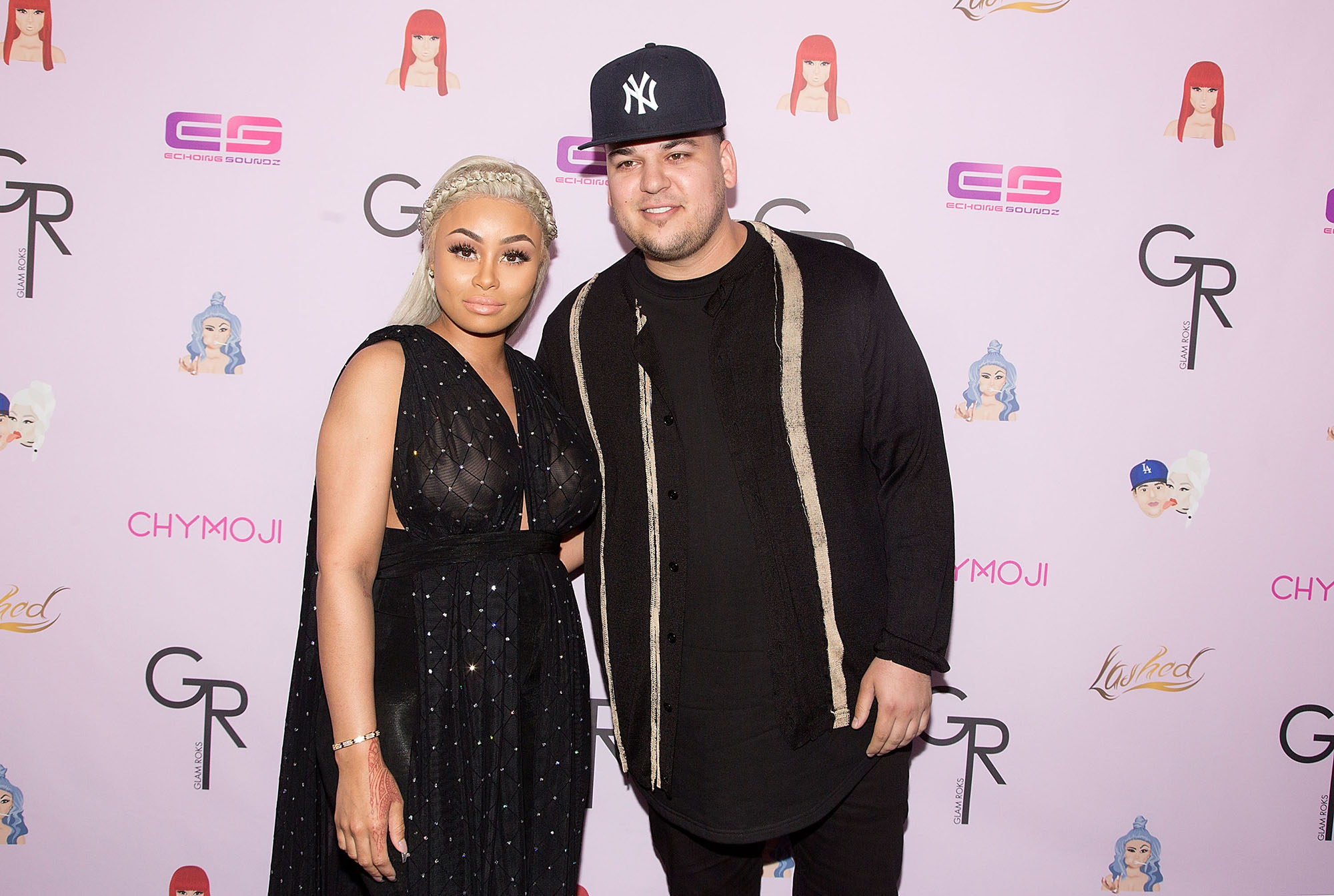 HOLLYWOOD, CA - MAY 10: Blac Chyna (L) and Rob Kardashian arrive for her Blac Chyna's birthday celebration and unveiling of her "Chymoji" Emoji Collection at Hard Rock Cafe, Hollywood, CA on May 10, 2016 in Hollywood, California. (Photo by Gabriel Olsen/WireImage)